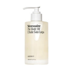 Nécessaire body oil bottle front with multi-nutrient formula for radiant skin