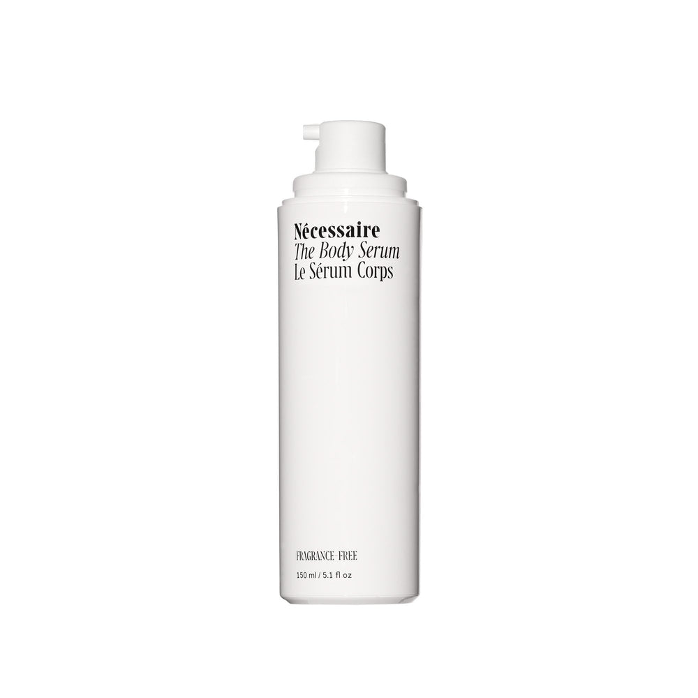 Nécessaire fragrance-free body serum bottle close-up for lightweight hydration.
