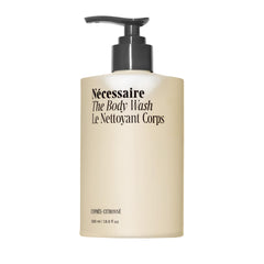 Nécessaire body wash bottle with cypress-lemon scent for a refreshing cleanse.
