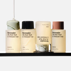 Nécessaire Discovery Collection gift box front presents a premium self-care gift option.