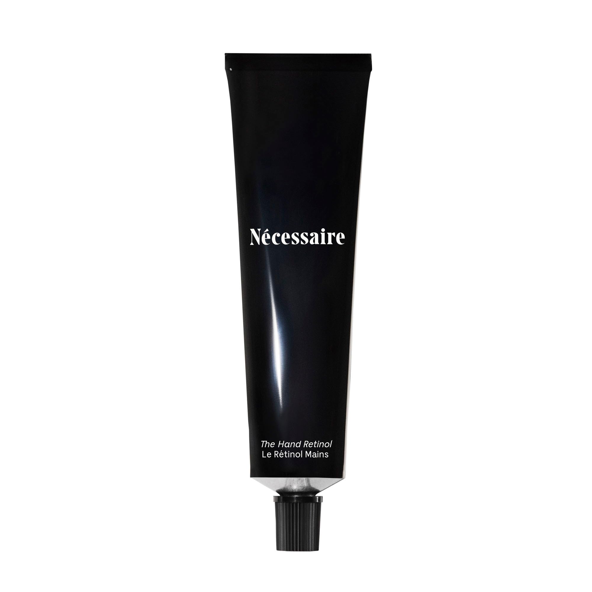 Nécessaire hand retinol serum balm texture showing rich, nourishing feel for hands