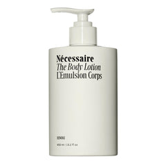 Nécessaire Hinoki body lotion bottle for quick, non-greasy hydration.
