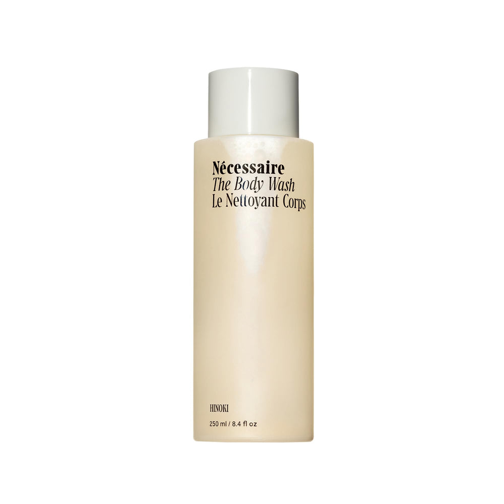 Nécessaire Hinoki body wash bottle in shower ready for daily cleansing