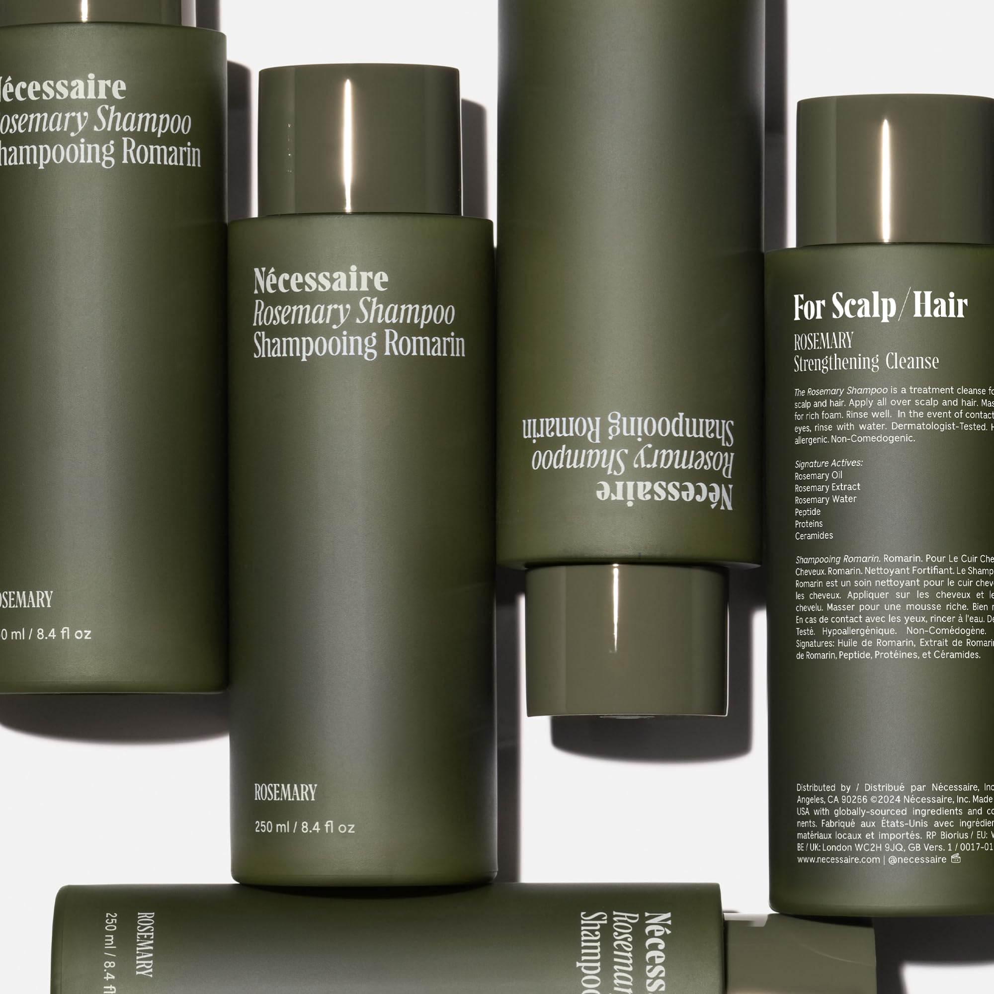 Nécessaire Rosemary Shampoo foam texture on palm indicating gentle daily cleanse.