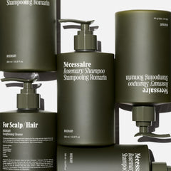Nécessaire Rosemary Shampoo label closeup showing color-safe formula.