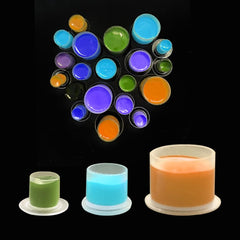 Needlehouse tapas de tinta transparentes, permiten ver el nivel de pigmento en tiempo real.