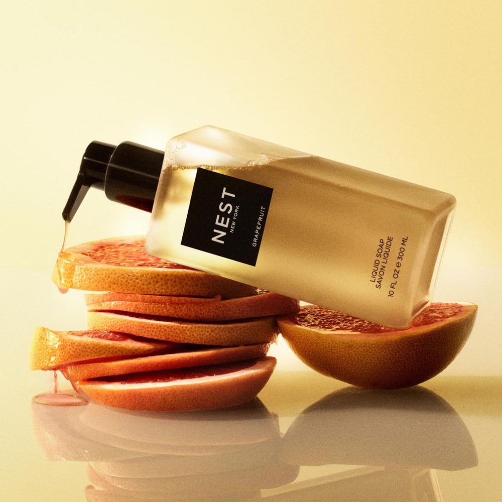 Grapefruit note visuals in bottle with lily of the valley elements