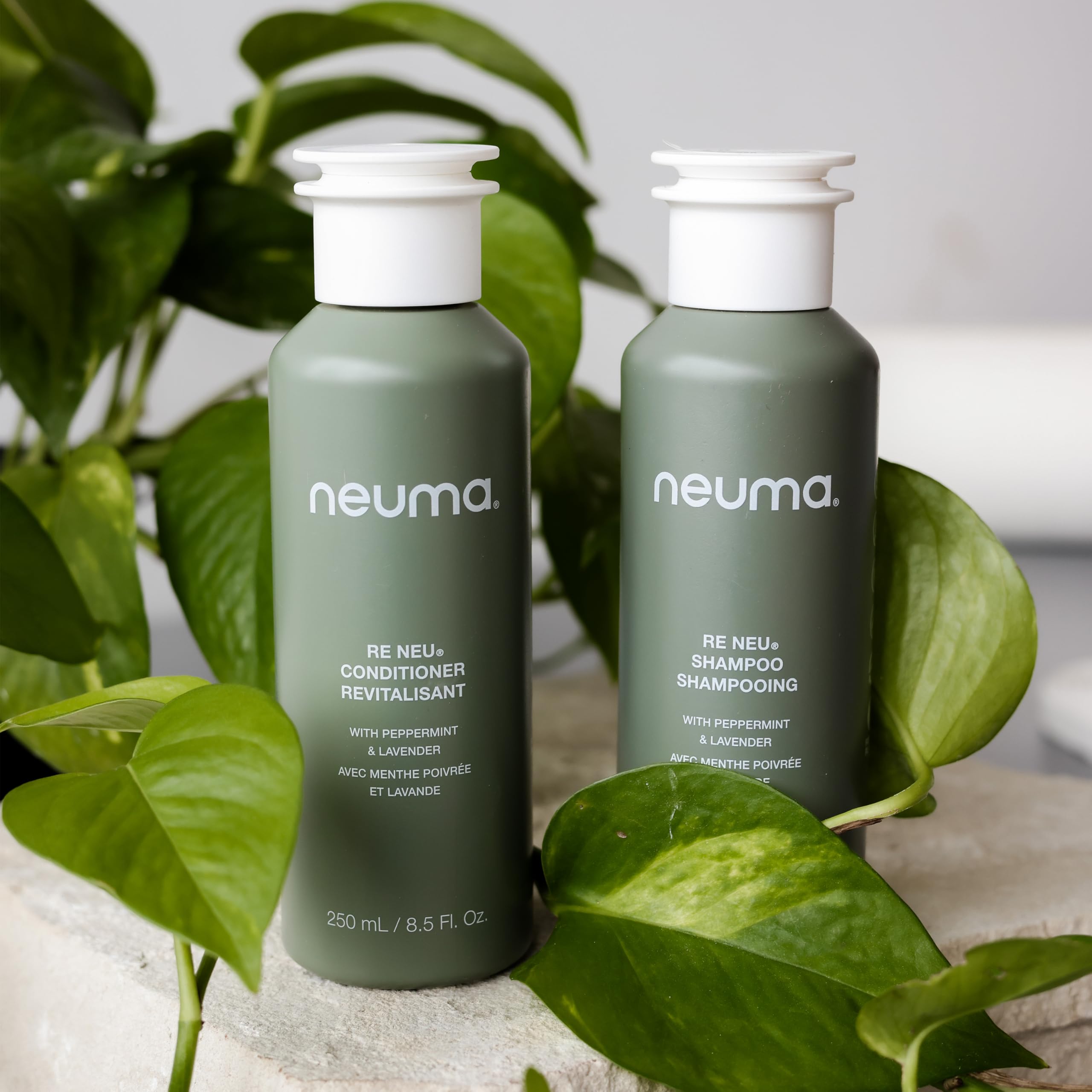 Neuma Re Neu bottle in shower scene suggests versatile hair type use