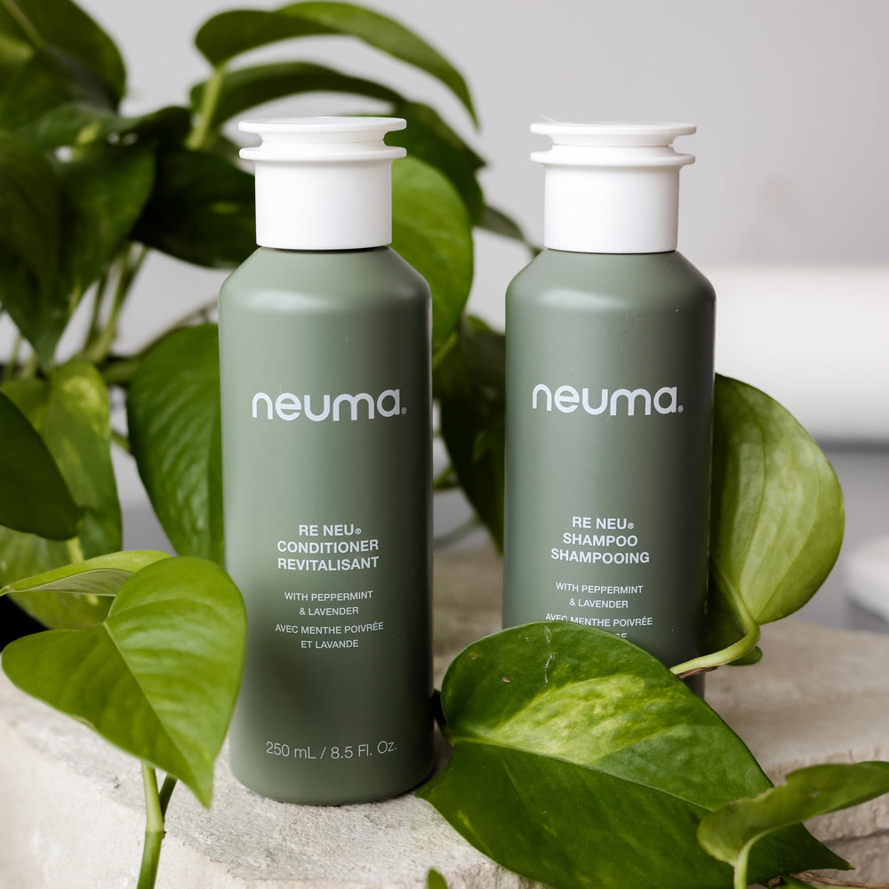 Neuma Re Neu bottle in shower scene suggests versatile hair type use