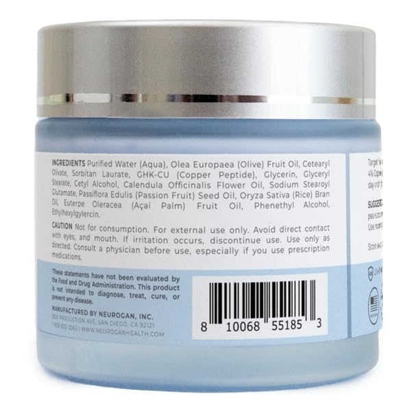 Neurogan GHK-Cu face cream applied to hand for silky hydration test.