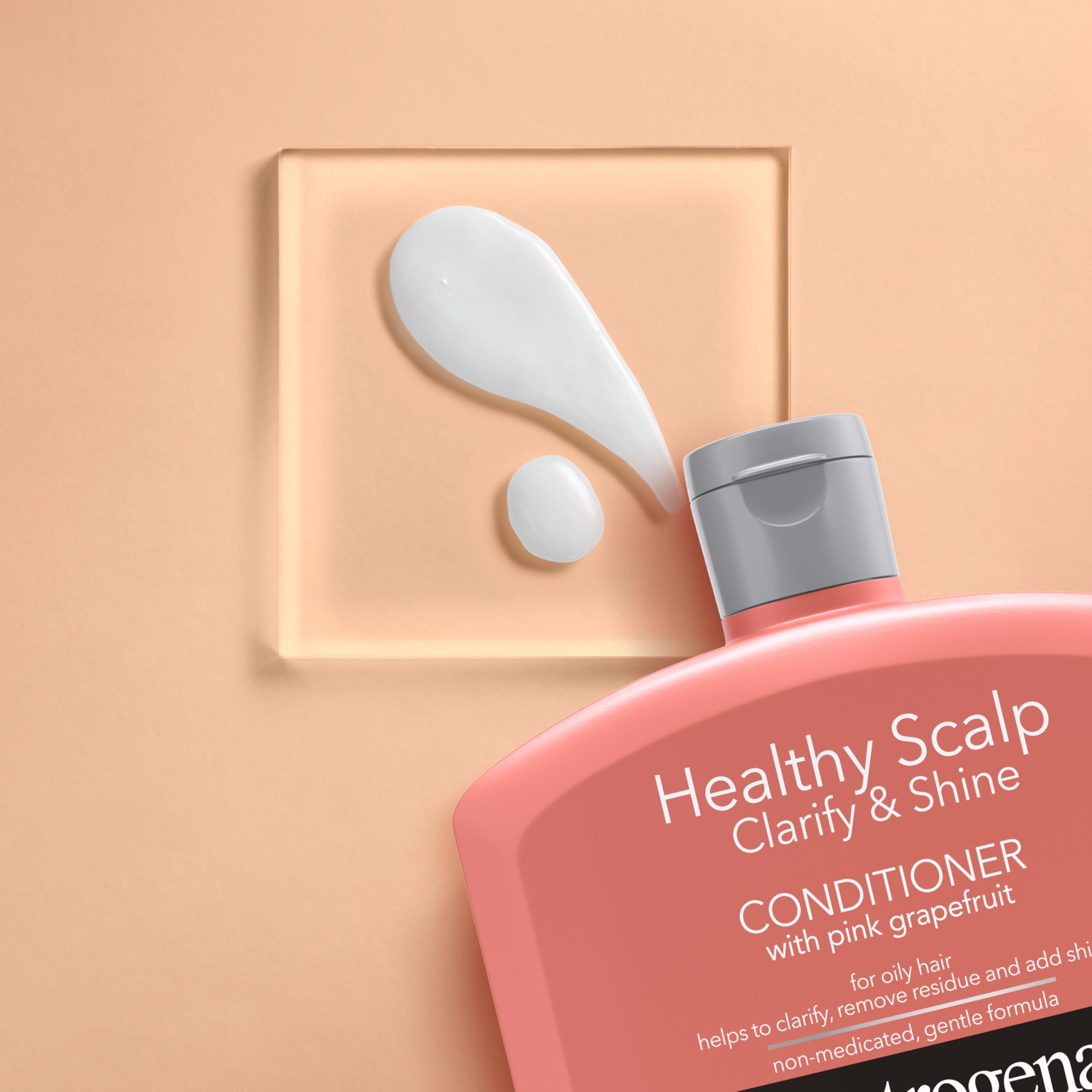 Neutrogena Exfoliating Healthy Scalp Clarify & Shine: pomelo rosa iluminado en iluminación natural