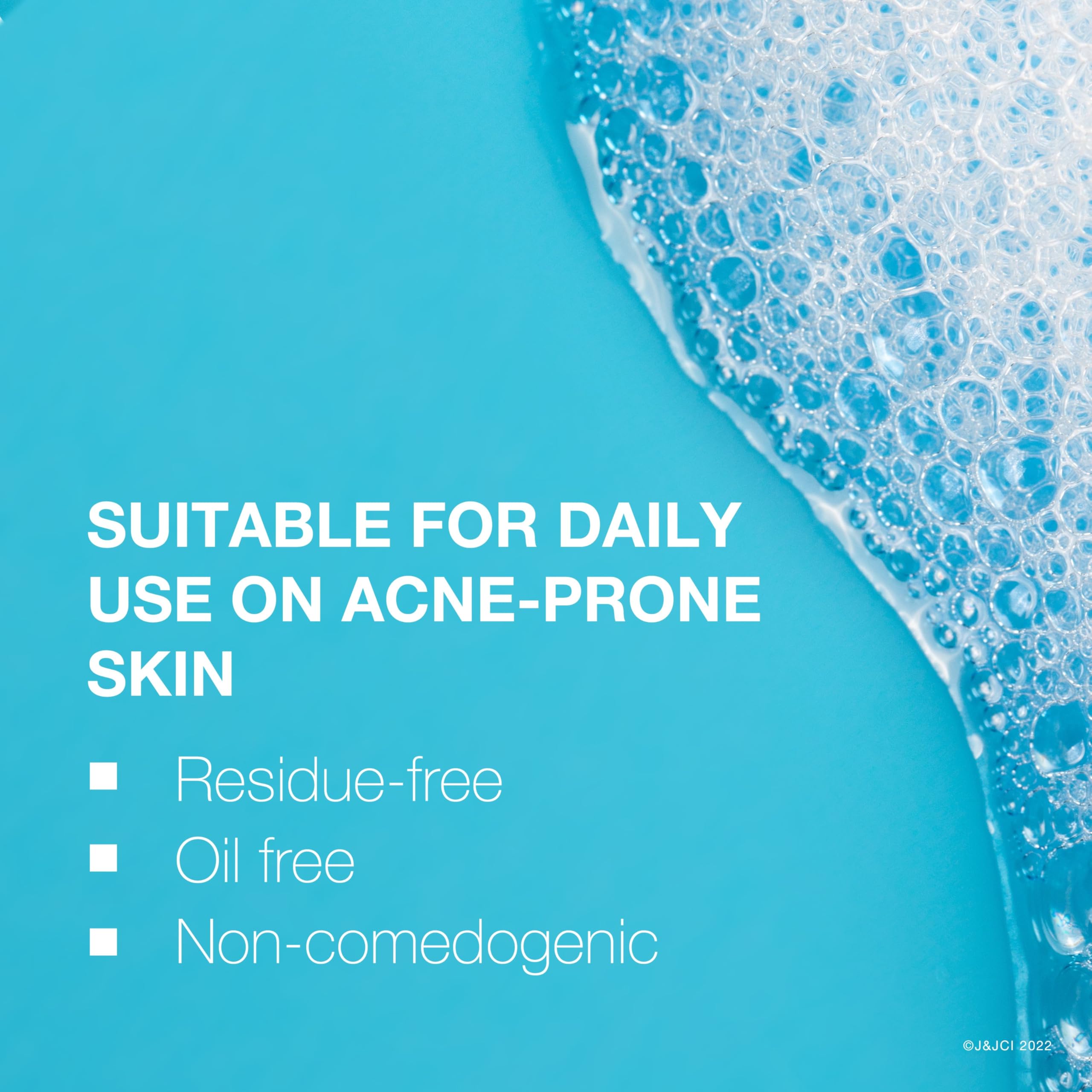 Neutrogena bottle in bathroom sink for daily facial cleansing.