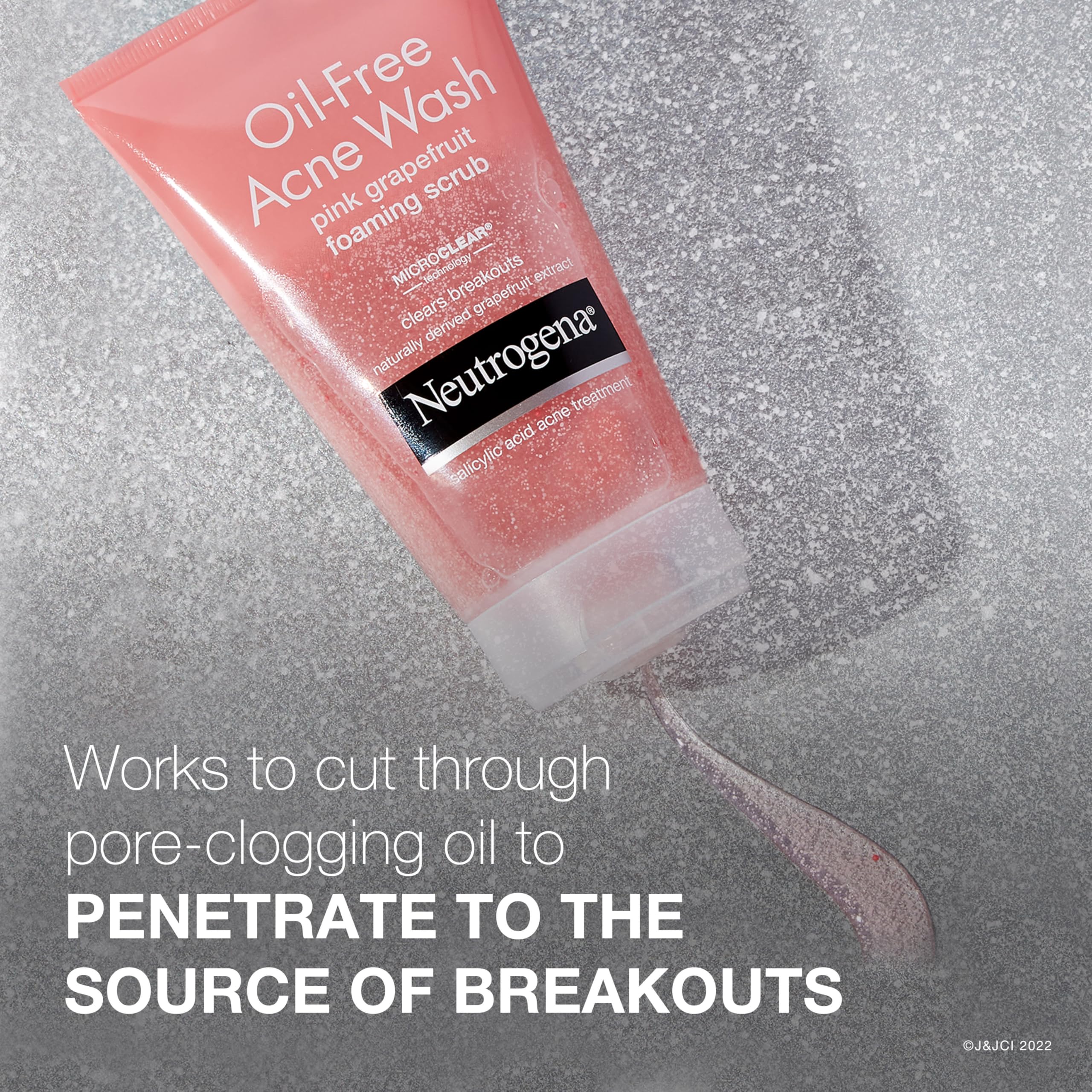 Neutrogena oil-free cleanser shown in a shower-ready skincare setup.