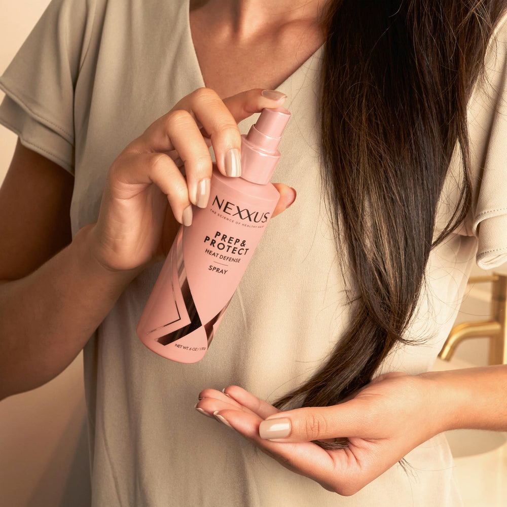 Nexxus Heat Defense Spray, envase compacto para llevar en la bolsa
