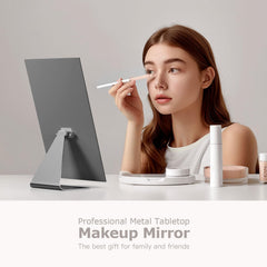 NEZZOE mirror on sturdy metal base stays stable on any surface.
