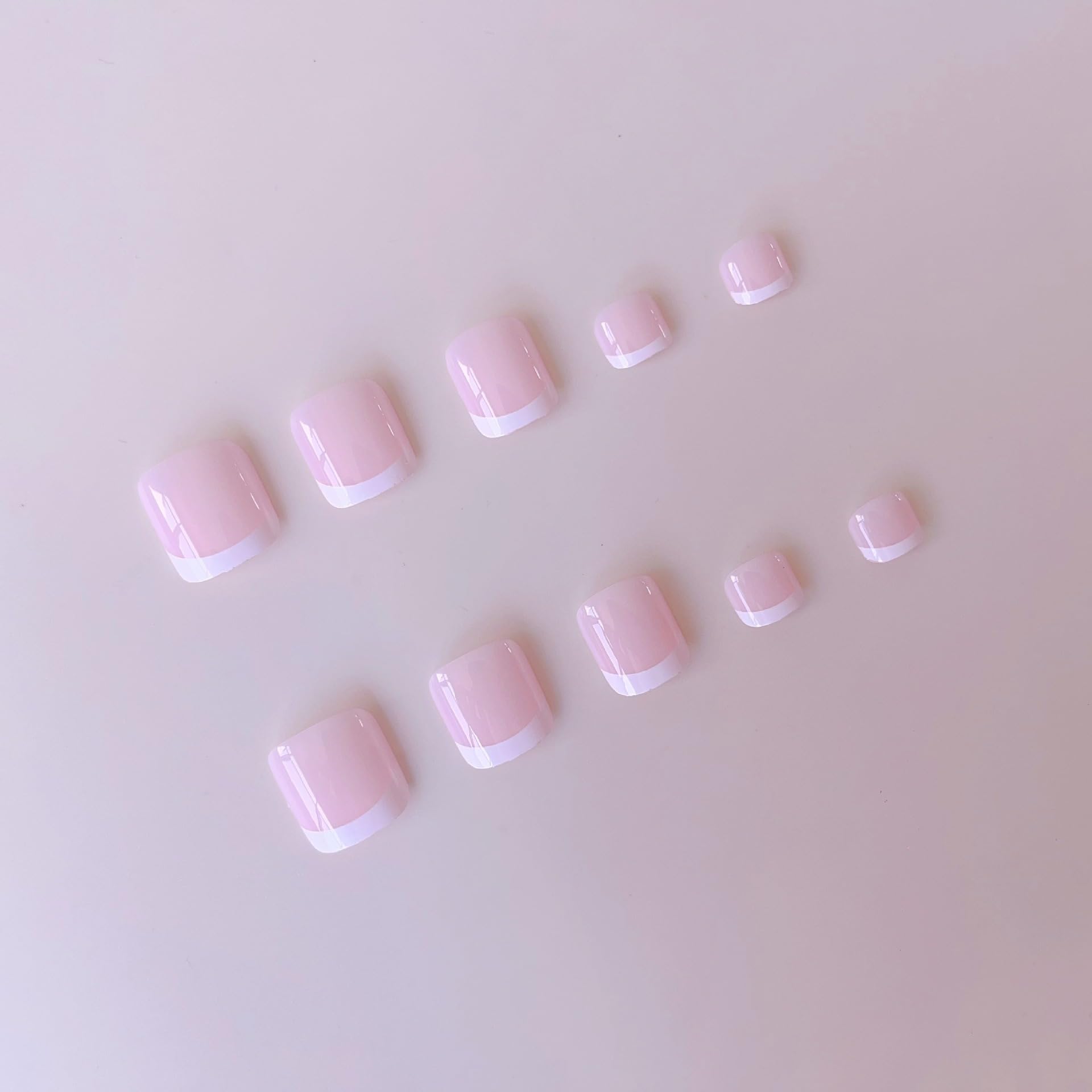 NHIXK wooden stick applicator for easy placement of press-on nails.