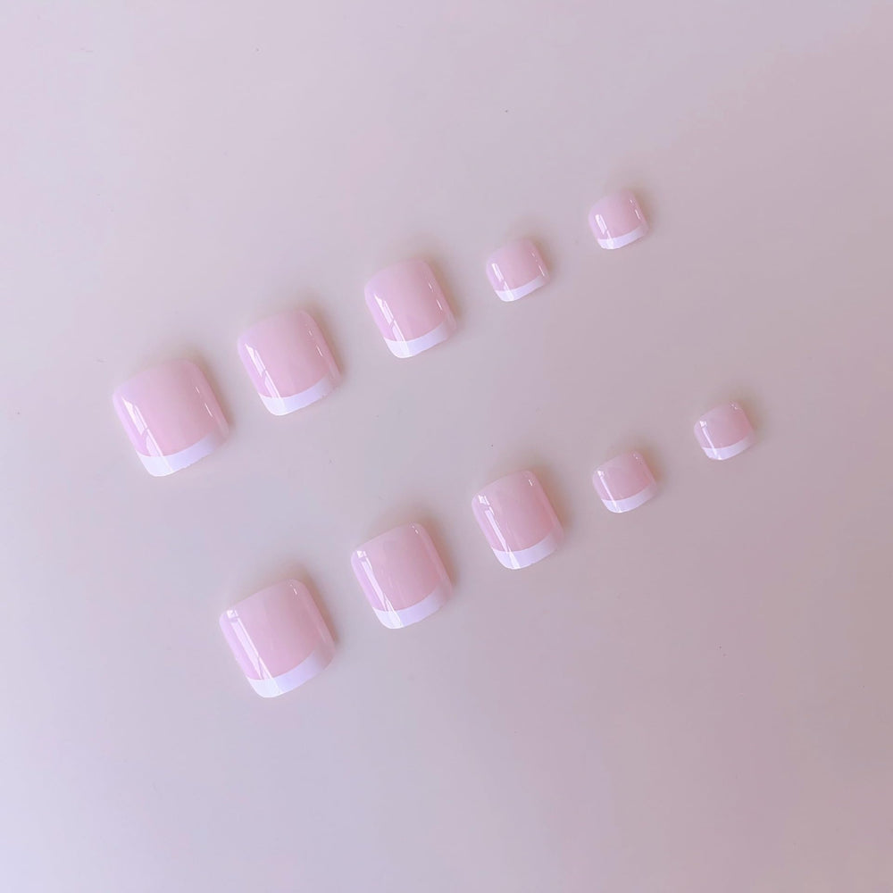 NHIXK wooden stick applicator for easy placement of press-on nails.