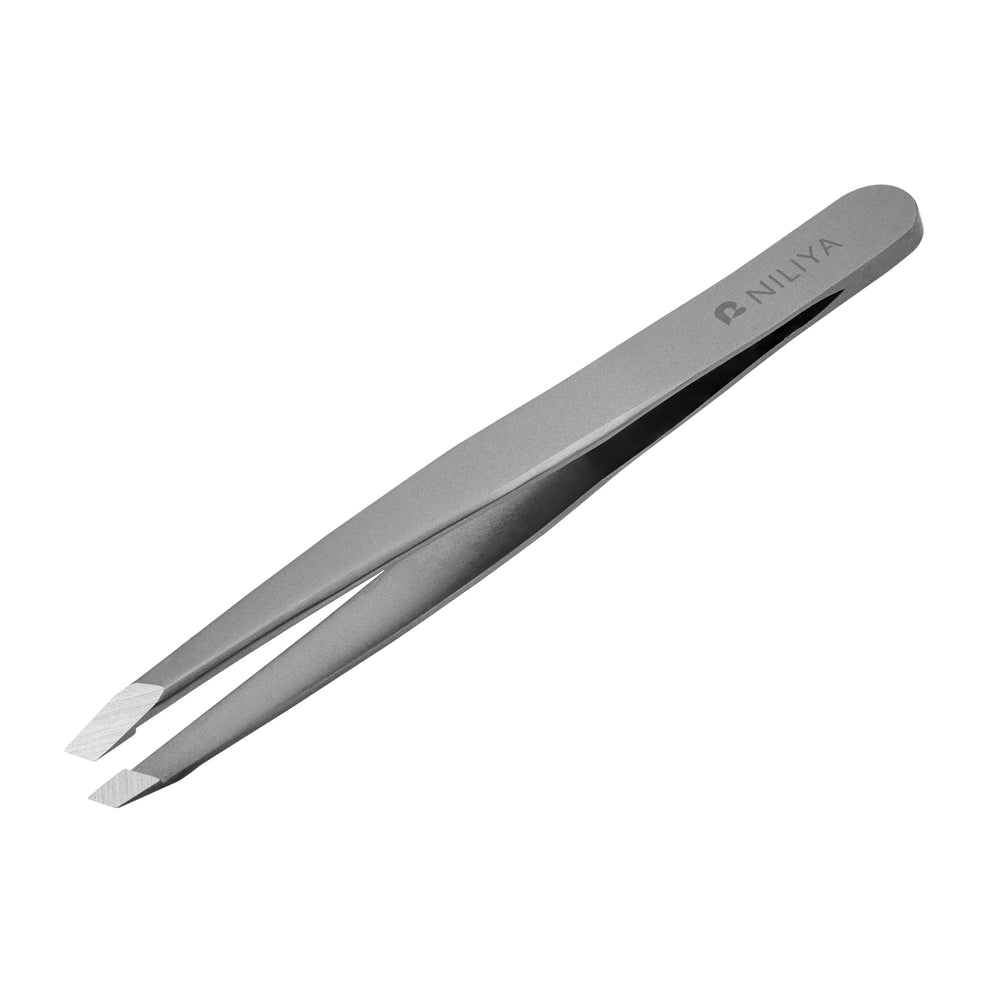 NILIYA Eyebrow Tweezers enabling salon-like detailing for brows and ingrown hairs.