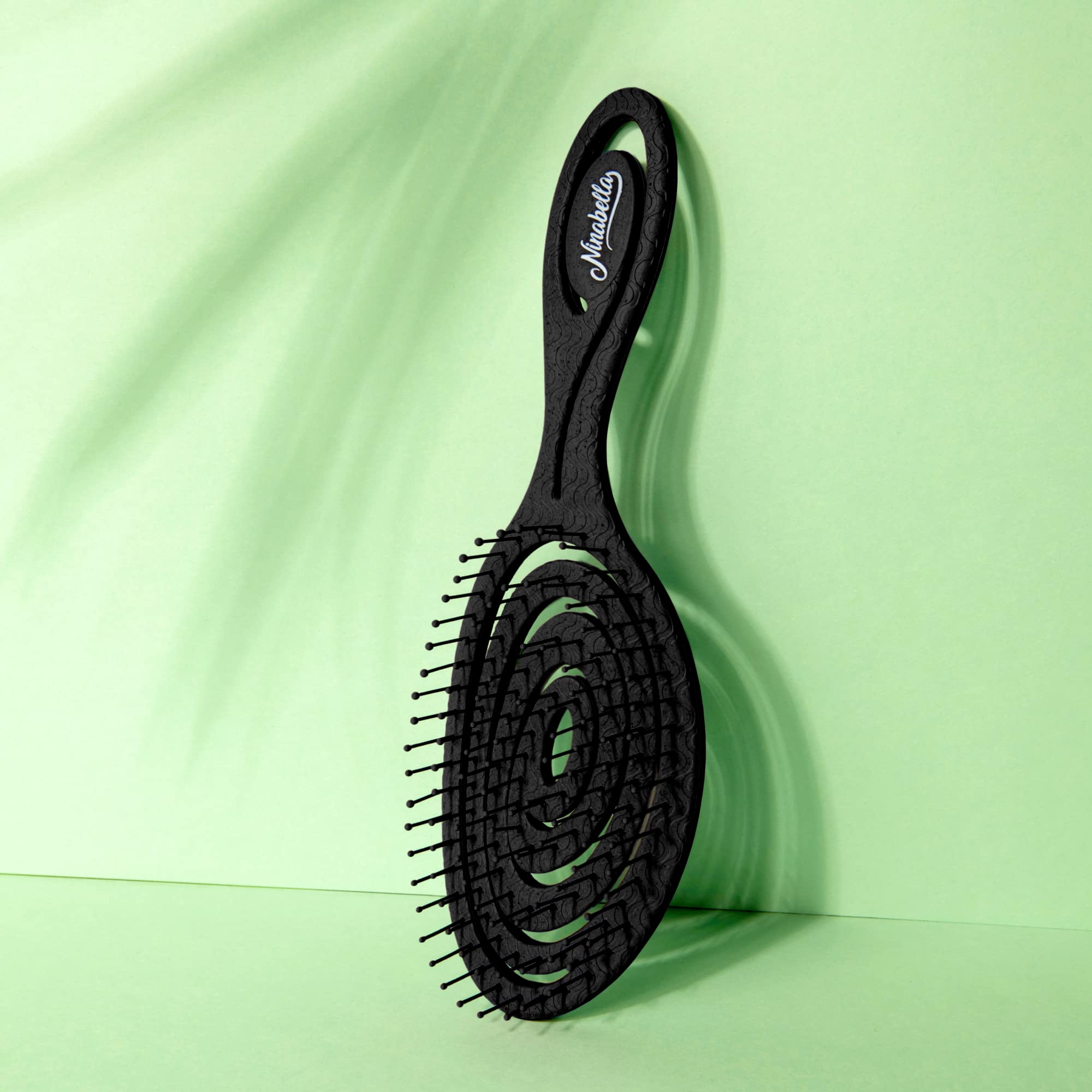 Ninabella detangle brush works on curly, straight, and wavy hair textures