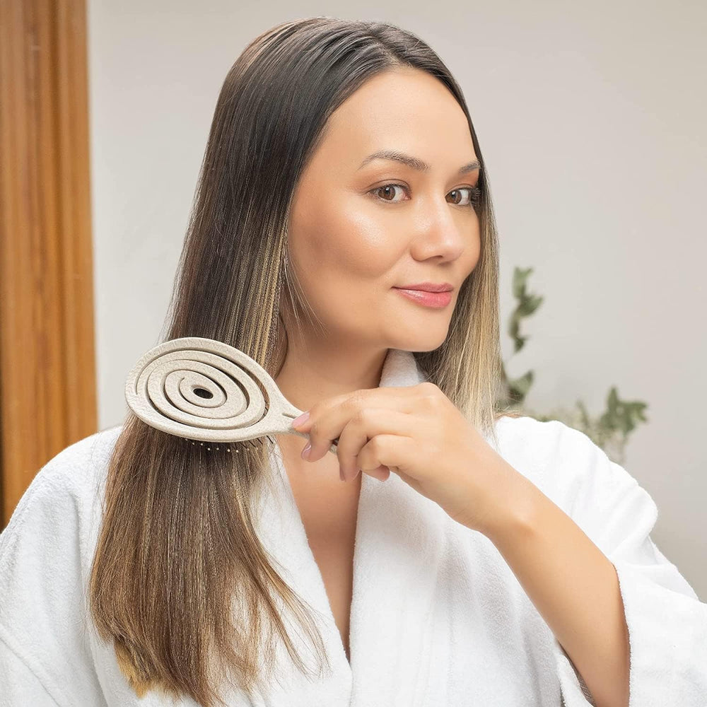 Ninabella Detangle Brush suitable for curly, straight, and wavy hair.
