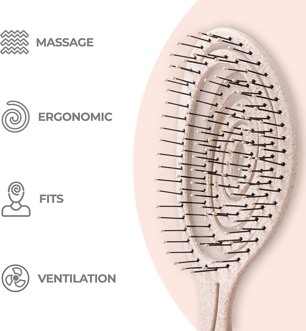 Ninabella Detangle Brush ergonomic-handle designed for comfortable, extended brushing sessions.