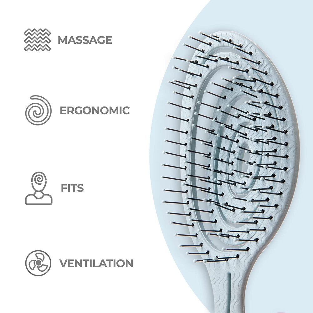 Ninabella detangle brush in use, reducing pulling during brushing