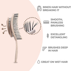 Ninabella Detangle Brush with soft spiral bristles gliding through knots without pulling.