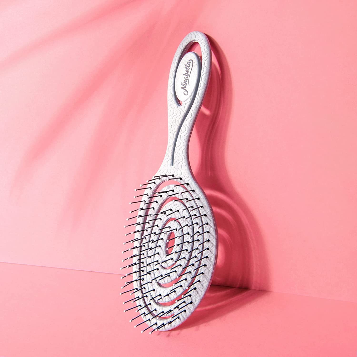 Ninabella detangle brush spiral head in action for scalp-friendly detangling