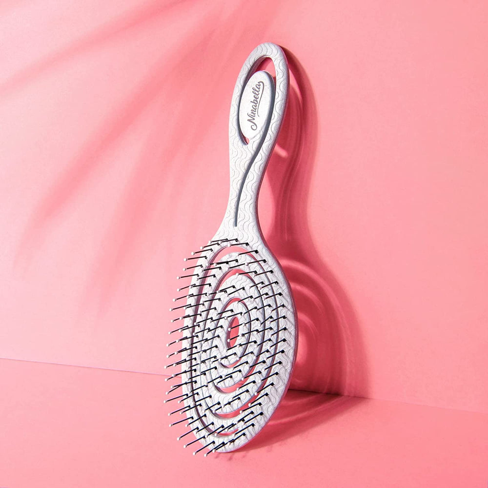 Ninabella detangle brush spiral head in action for scalp-friendly detangling
