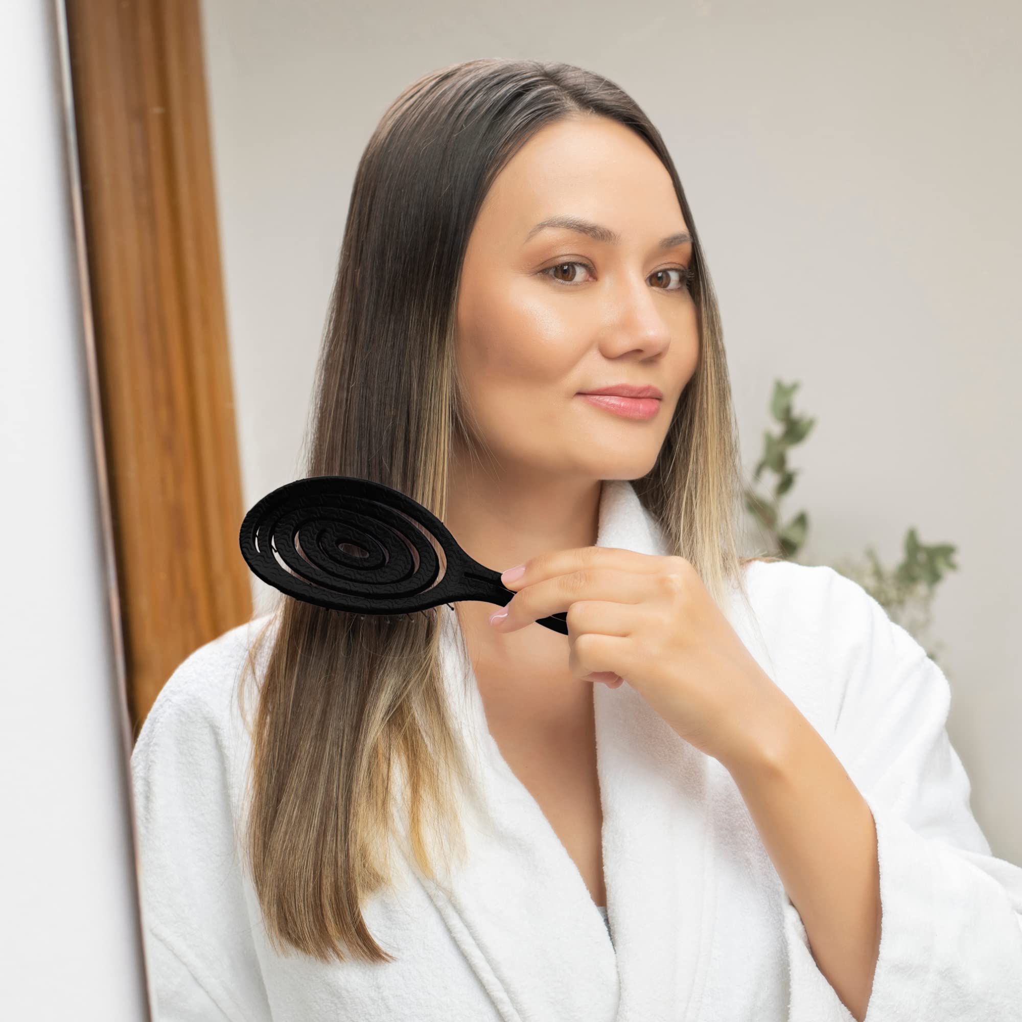 Ninabella detangle brush keeps wigs and extensions smooth and manageable