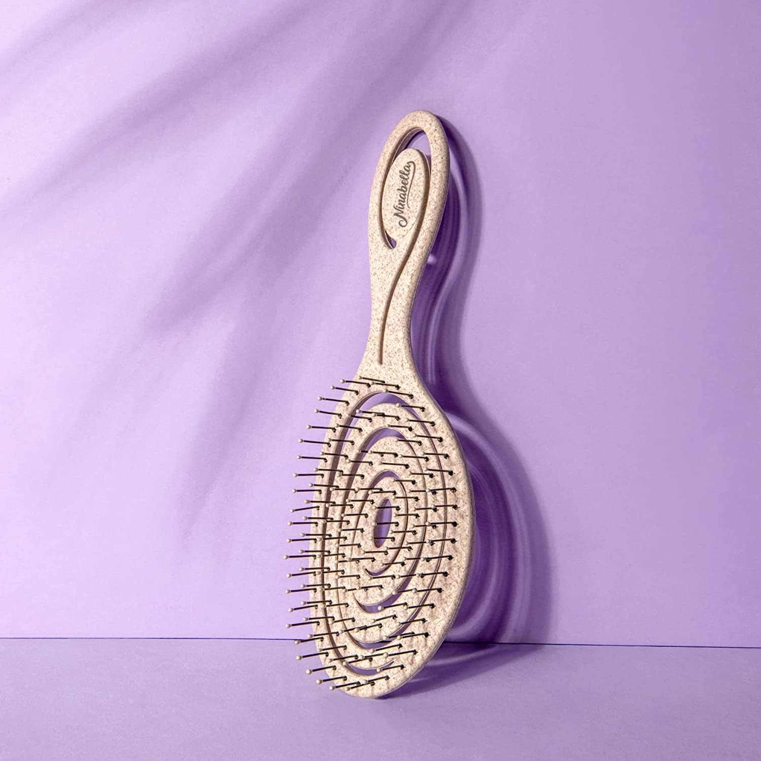 Ninabella Detangle Brush wigs and extensions-friendly detangling for smooth styling.