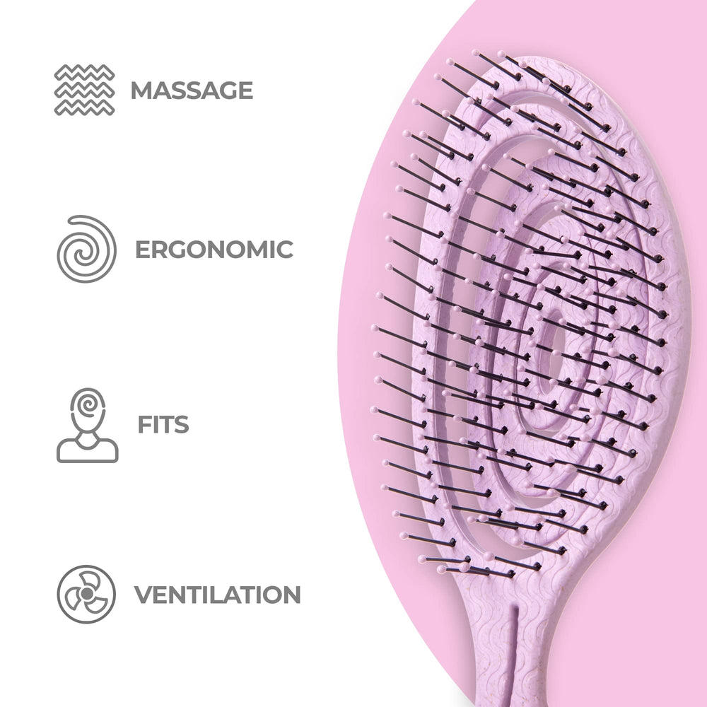 Ninabella detangle brush used on wet hair to minimize pulling.