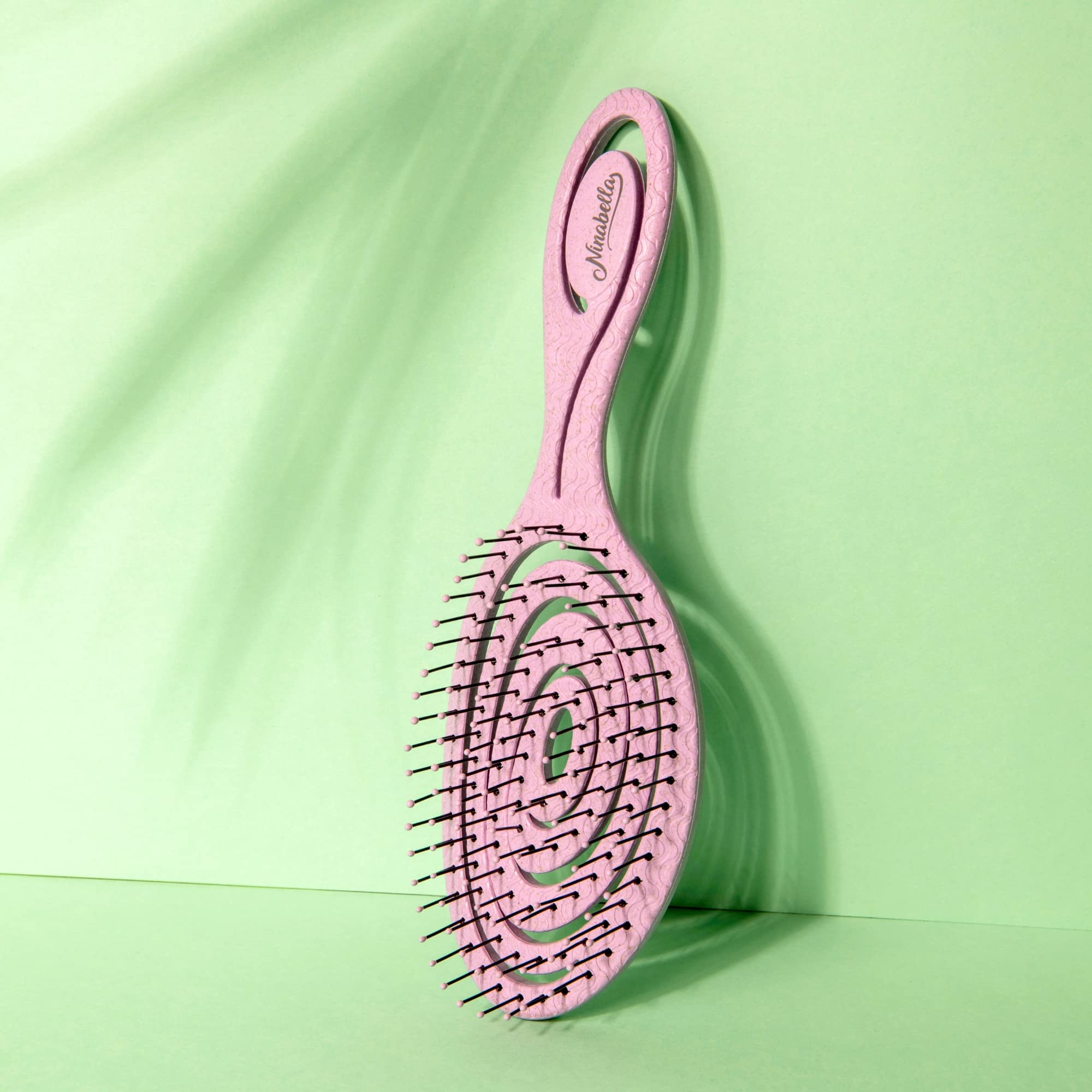 Ninabella detangle brush on wig to help maintain style.