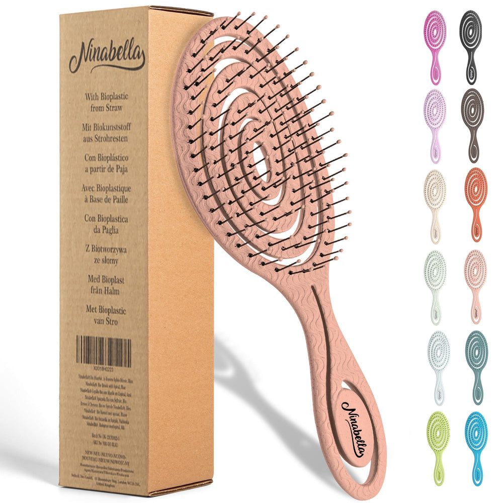 Ninabella detangling brush rose gold spiral head for gentle, pain-free detangling.
