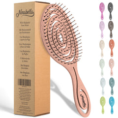 Ninabella detangling brush rose gold spiral head for gentle, pain-free detangling.