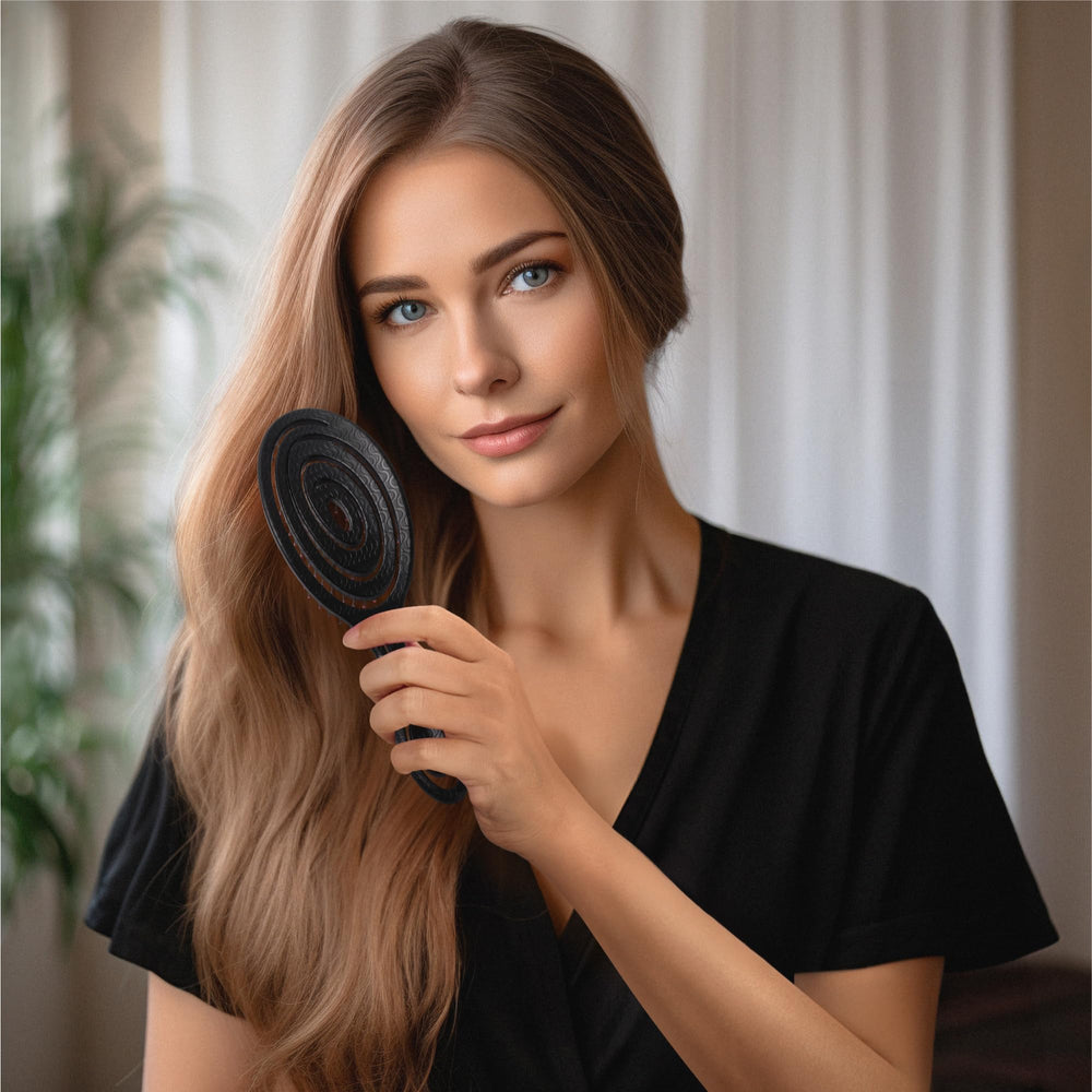 Ninabella Spiral Hairbrush bristles provide gentle scalp massage while detangling.