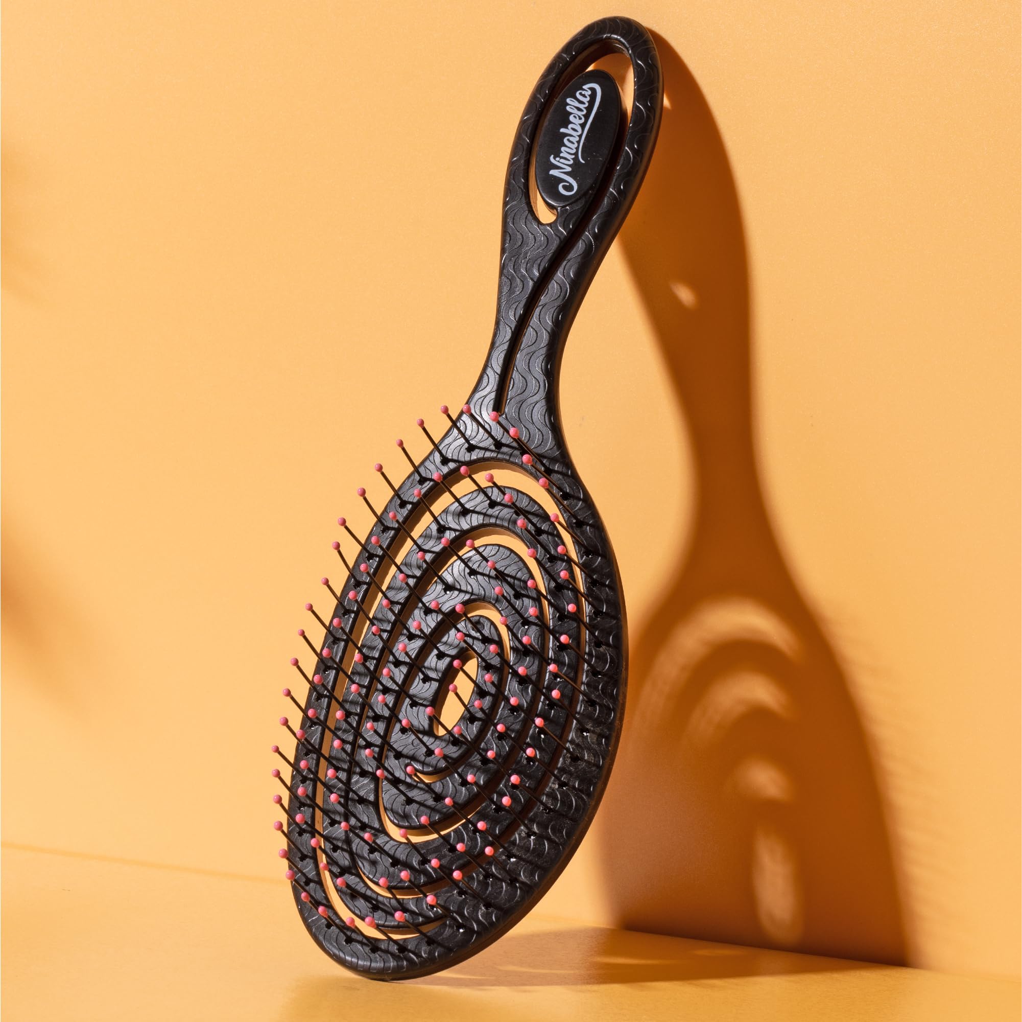 Ninabella Spiral Hairbrush suitable for blow-drying to speed up styling.