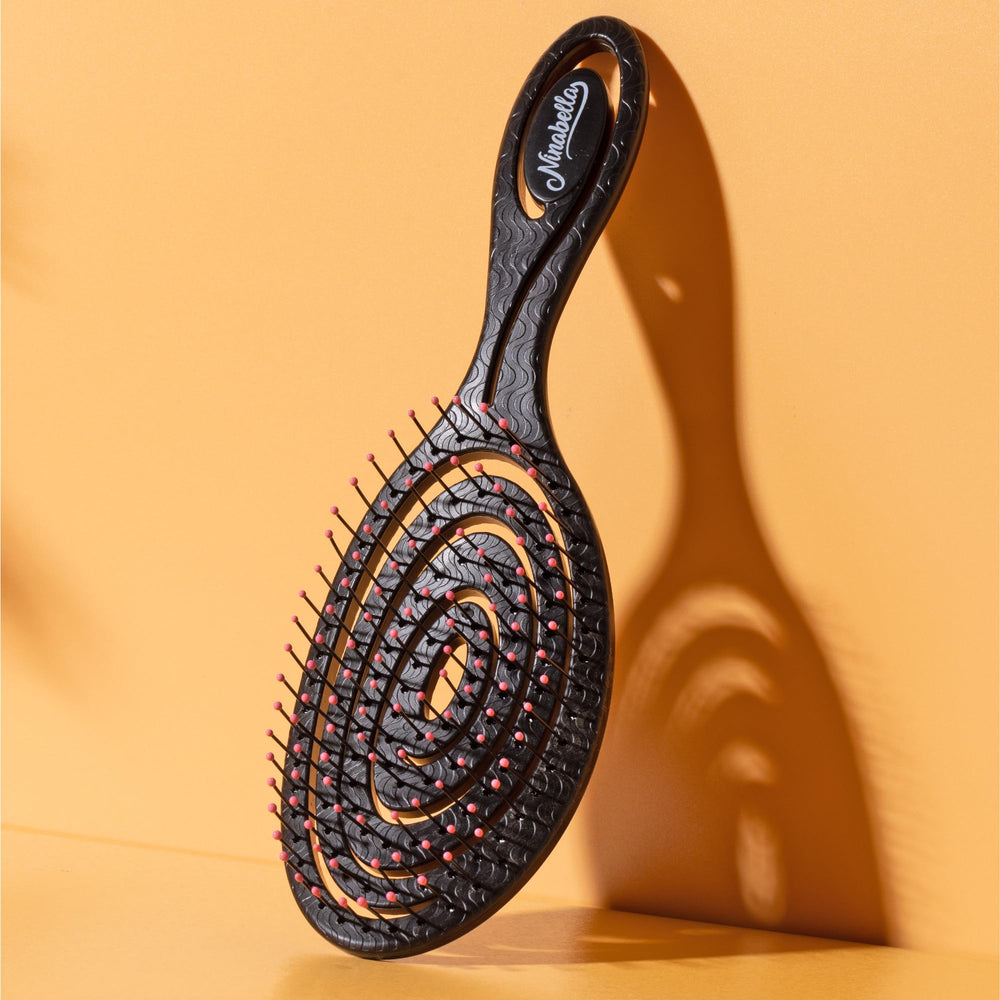 Ninabella Spiral Hairbrush suitable for blow-drying to speed up styling.