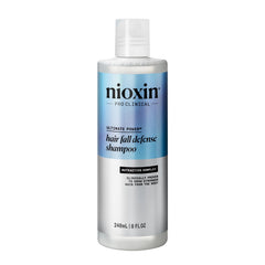 NIOXIN Hair Fall Defense Shampoo bottle ready for daily scalp cleansing and impurities removal.