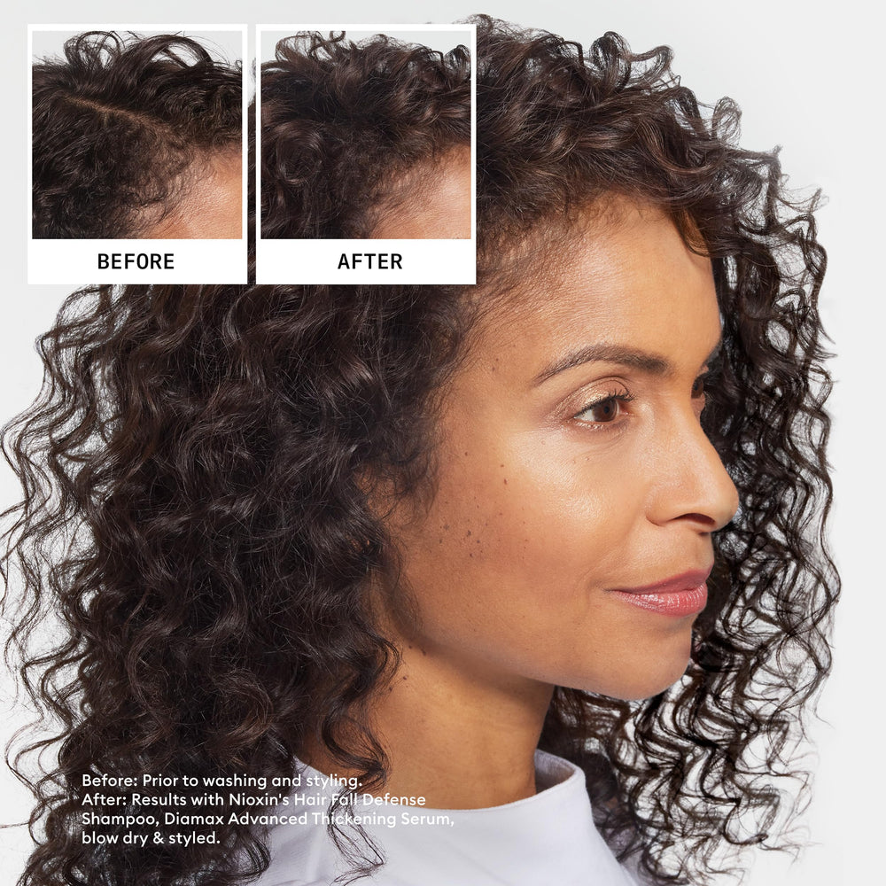 Nioxin Hair Fall Defense Shampoo on scalp during shower cleanses while supporting scalp care.