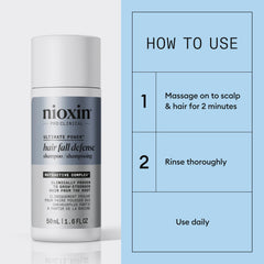 Nioxin Hair Fall Defense shampoo lather showing cleansing action