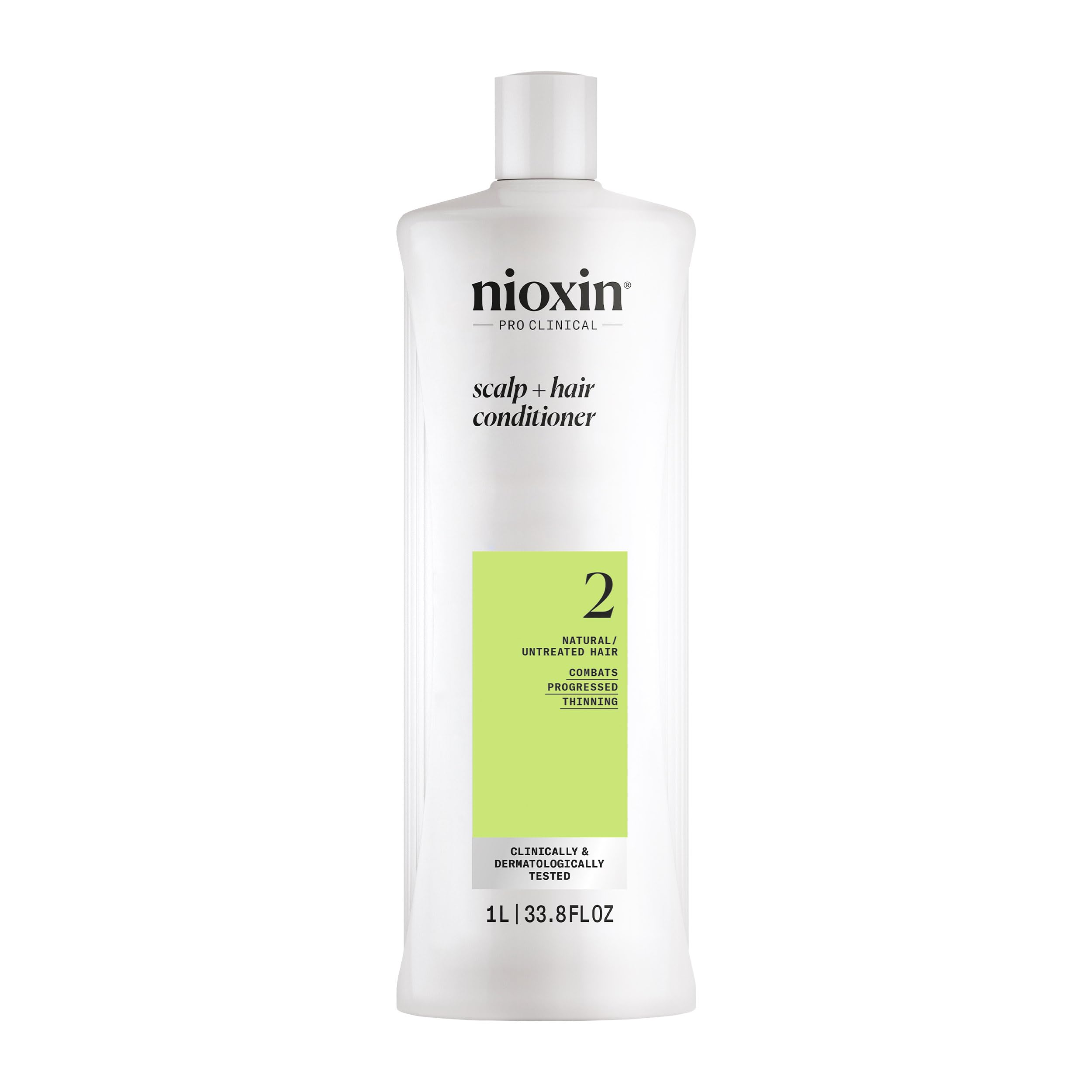 Nioxin System 2 conditioner bottle front showing smoother, fuller-looking hair