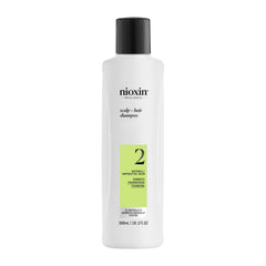 Nioxin System 2 shampoo bottle for daily cleansing and thicker-looking hair.