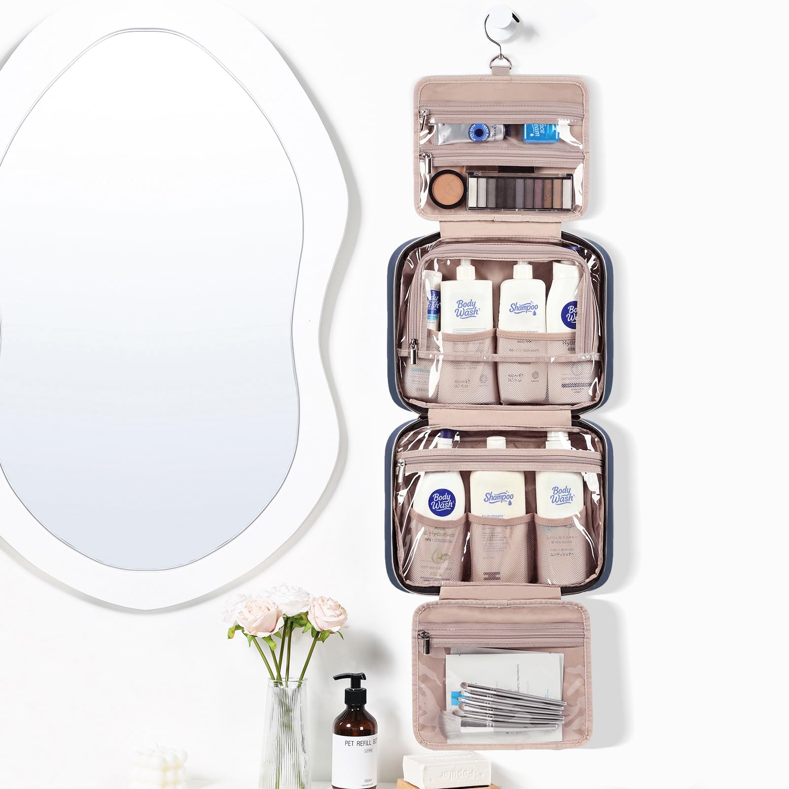 NISHEL bag open to reveal four compartments for organized storage.