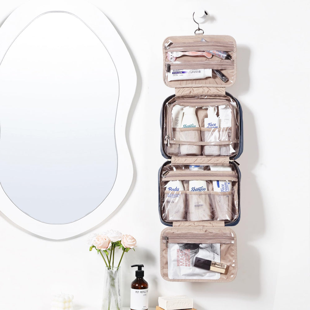 NISHEL bag with four compartments keeps cosmetics organized during travel.