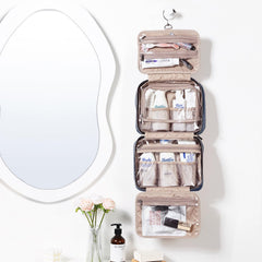 NISHEL bag with four compartments keeps cosmetics organized during travel.
