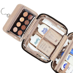 NISHEL bag interior with mesh pockets keeps bottles upright and organized.