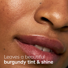 NIVEA Blackberry Lip Care swatch demonstrates burgundy tint and subtle shine.