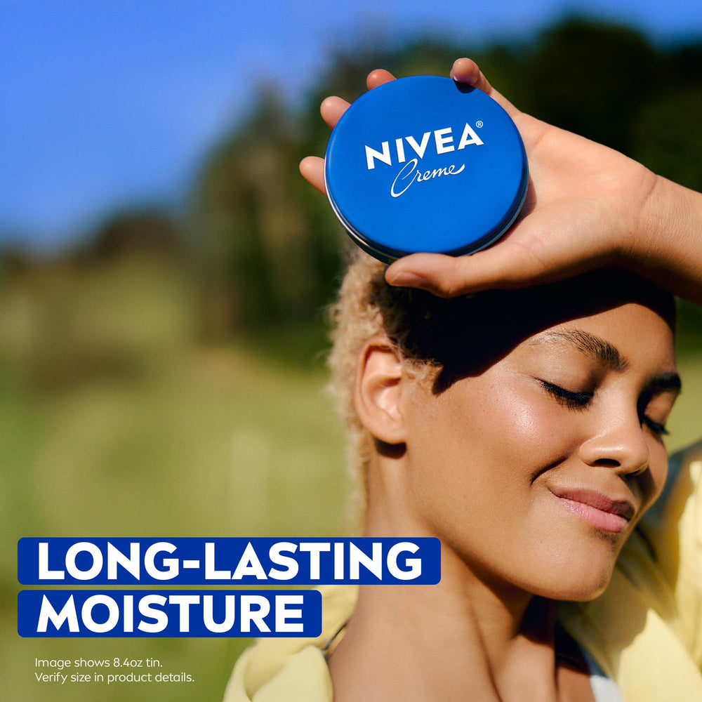 NIVEA Creme applied on the hand demonstrates multitasking hydration for dry skin.
