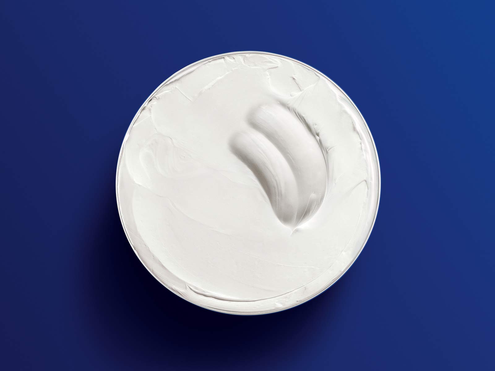 NIVEA Creme on body, smoothing rough areas for softness